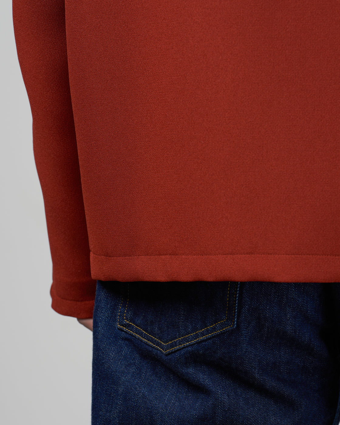 Dhal テーラードジャケットBrickの内側構造、裏地の仕立てと縫製の丁寧さ、二重織りジャージー素材の特性、自宅で洗濯可能な実用性、日本製の品質、ボタンまでこだわったディテール、keylime Tokyo取扱、レンガ色
