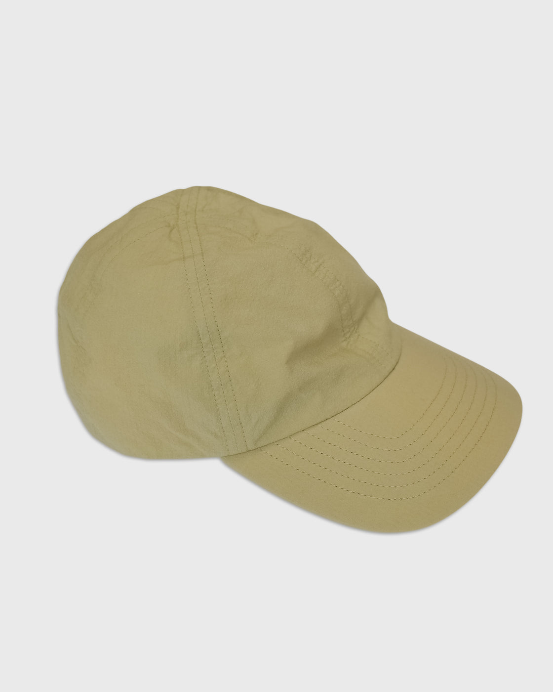 MATURE HA._MIL Trainer Cap Low Lipstop Washed, Muted Yellow