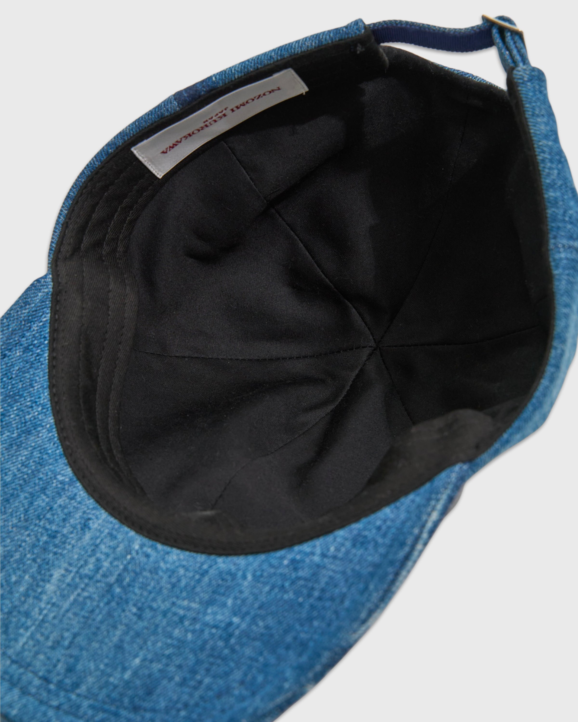 NOZOMI KUROKAWA Cap, Indigo